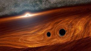 Read more about the article Scientists spot flash of light from colliding black holes. But how?